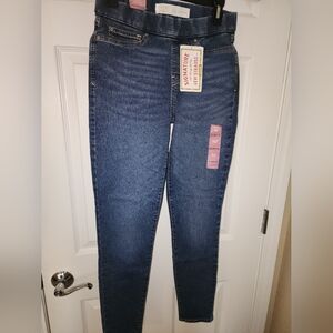 Signature by Levi Strauss.  Pull on skinny distressed dark denim.